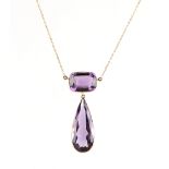 A yellow gold amethyst pendant necklace, the pear shaped pendant amethyst measuring approximately