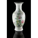 A Chinese famille rose baluster vase, painted with peonies among rockwork, iron red Qianlong 4-