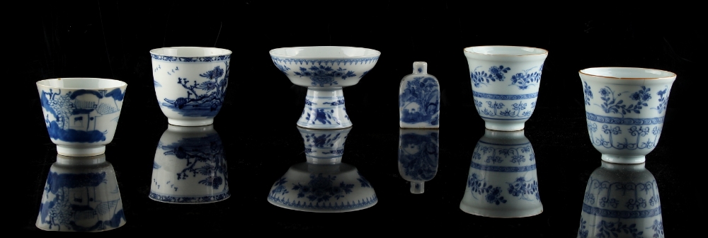 A group of six Chinese blue & white items, 18th century & later, comprising a stem cup, four beakers