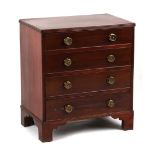 Property of a deceased estate - a small mahogany chest of four long graduated drawers, with brass