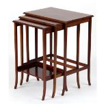 Property of a lady - an Edwardian mahogany & rosewood banded nest of three occasional tables, the