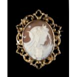 A Victorian carved oval shell cameo brooch depicting the Roman goddess Luna, depicted with an Owl,