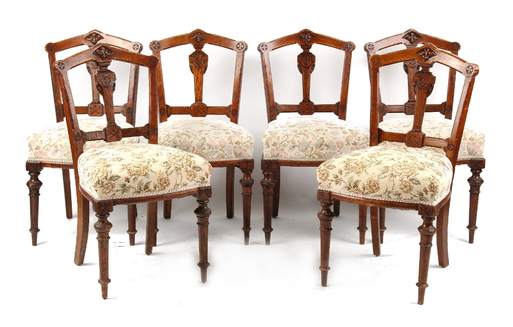 Property of a lady - a set of six Victorian Gothic Revival carved oak side chairs (6) (see