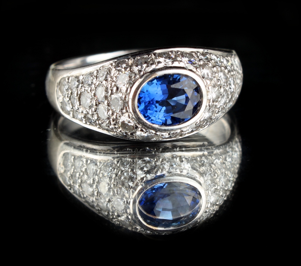 A modern 18ct white gold sapphire & diamond ring, the oval cut Ceylon sapphire weighing - Image 2 of 2