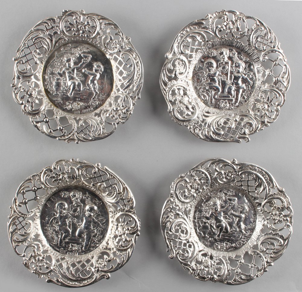 Property of a lady - a set of four small late 19th / early 20th century Dutch silver dishes, each
