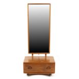 Property of a deceased estate - an Ercol elm 'Windsor' pattern cheval mirror with drawer to base,