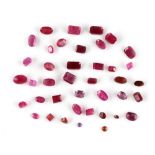 Loose gemstones - a bag containing variously cut rubies, approximately 18.08 carats total (see