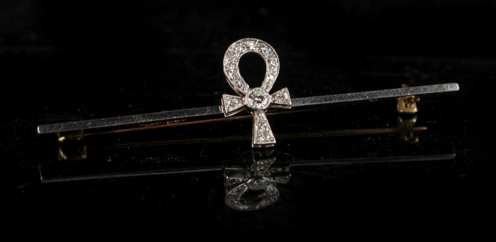 A 15ct yellow gold & platinum Ankh Cross brooch, set with fourteen diamonds, 2ins. (5cms.) long (see