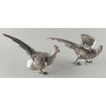 Property of a lady - a pair of silver models of pheasants, import marks for London 1959, tip of