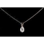 An 18ct white gold diamond pendant on 9ct white gold chain necklace, the pear shaped diamond