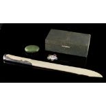 Property of a gentleman - an early 20th century unmarked silver mounted ivory paperknife, with