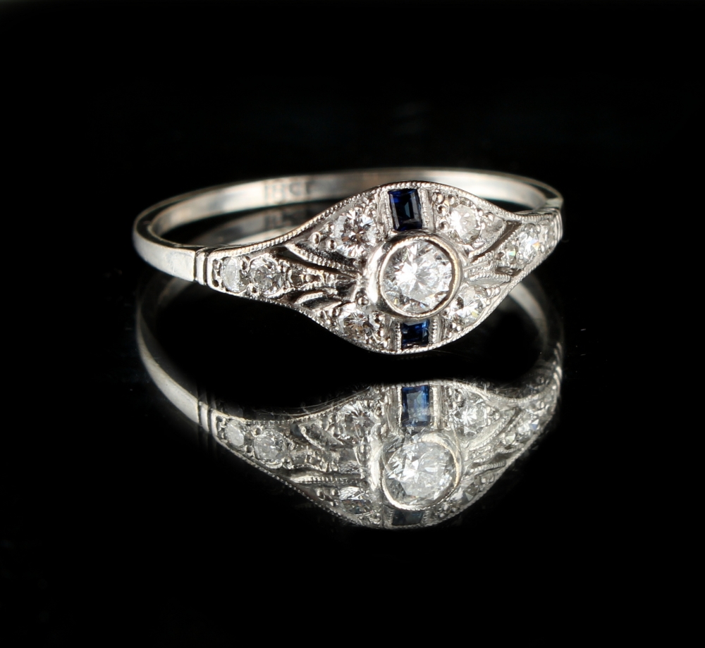 An 18ct white gold diamond & sapphire ring, with pierced oval millegrain setting, size P (see - Image 2 of 2