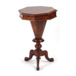 Property of a deceased estate - a Victorian walnut trumpet sewing table, with carved tripod base (