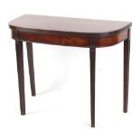 Property of a gentleman - an early 19th century mahogany D-shaped foldover tea table, with reeded