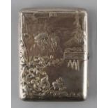 Property of a deceased estate - a heavy Russian silver cigarette case chased with figures in