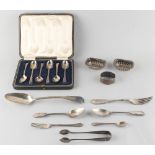 Property of a deceased estate - a bag containing assorted silver, mostly flatware, including a cased