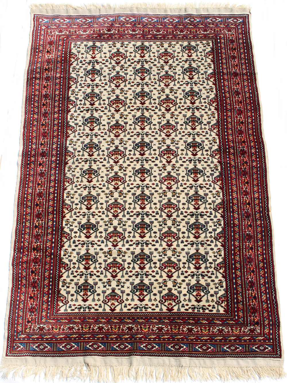 Property of a lady - a Turkoman rug with ivory field, third quarter 20th century, condition very