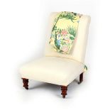 Property of a lady - a Victorian upholstered nursing chair with turned front legs & castors, with