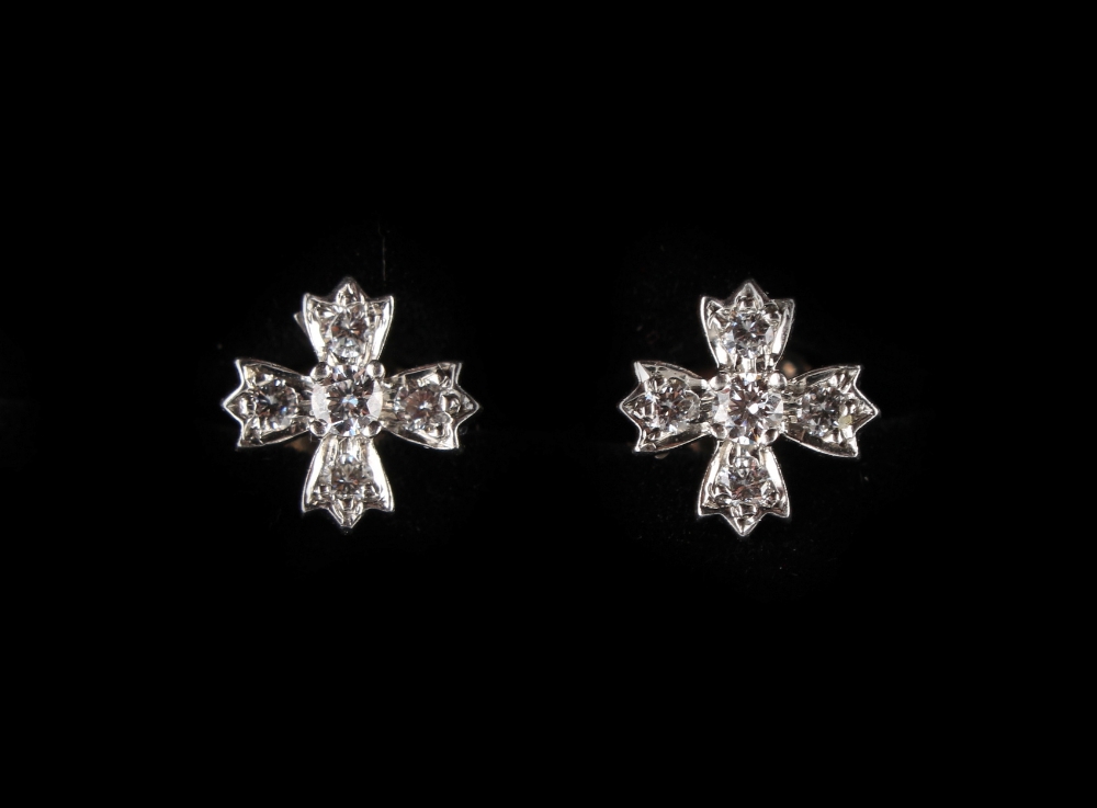 Tiffany & Co. - a pair of platinum diamond flowerhead earrings, with post & butterfly fastenings,