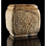 A Chinese white marble cube pillow, Ming Dynasty (1368-1644), carved with flowers, 7.3ins. (18.