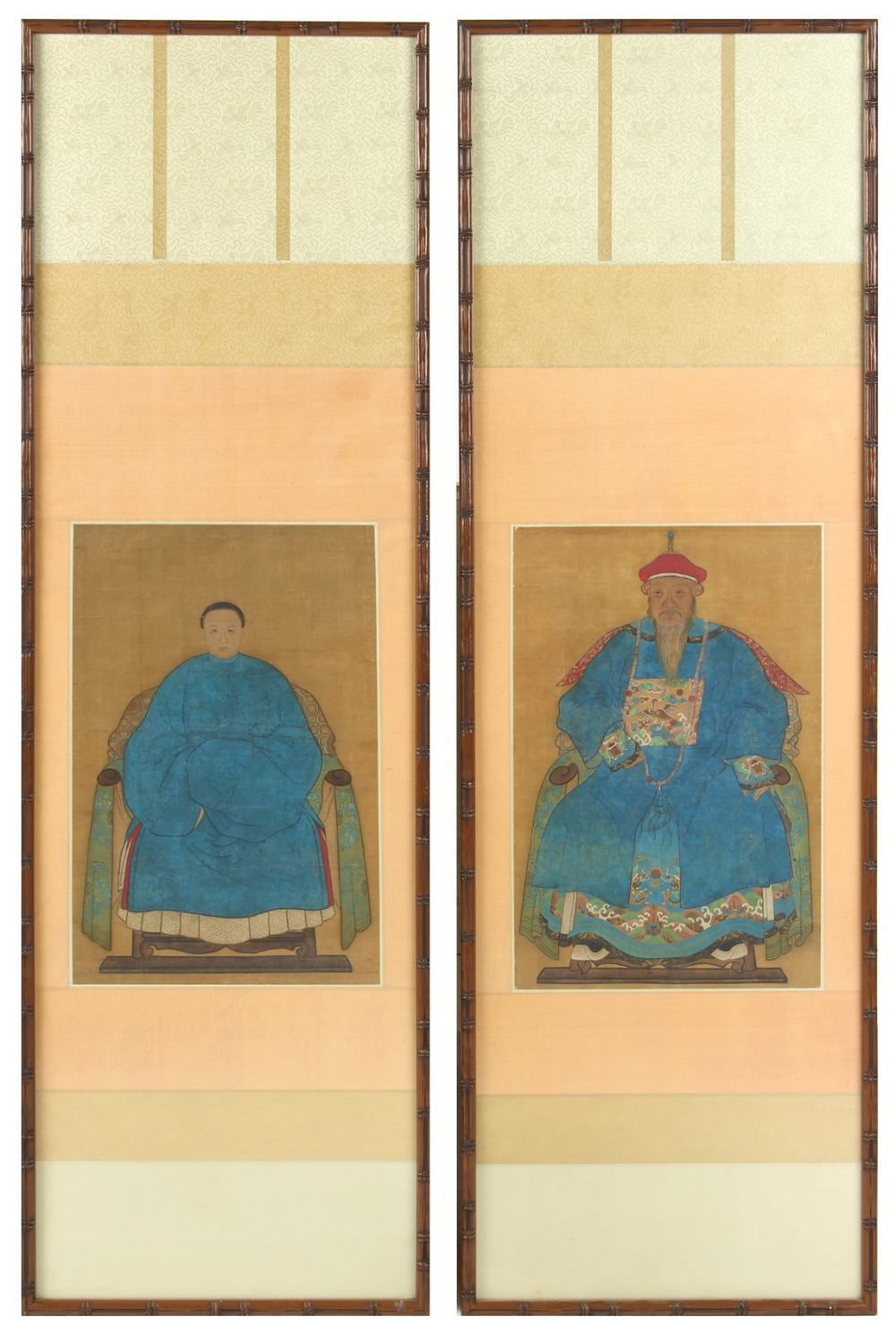 A pair of late 19th / early 20th century Chinese ancestor scroll paintings on silk, the paintings