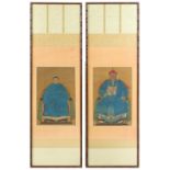 A pair of late 19th / early 20th century Chinese ancestor scroll paintings on silk, the paintings