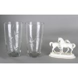 Property of a gentleman - two matching glass vases, early 20th century, with star cut decorations,