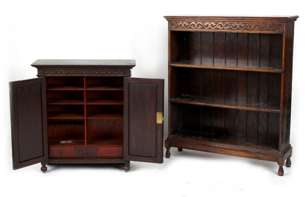 Property of a deceased estate - a 1920's oak two-door wall cabinet with geometric mouldings,