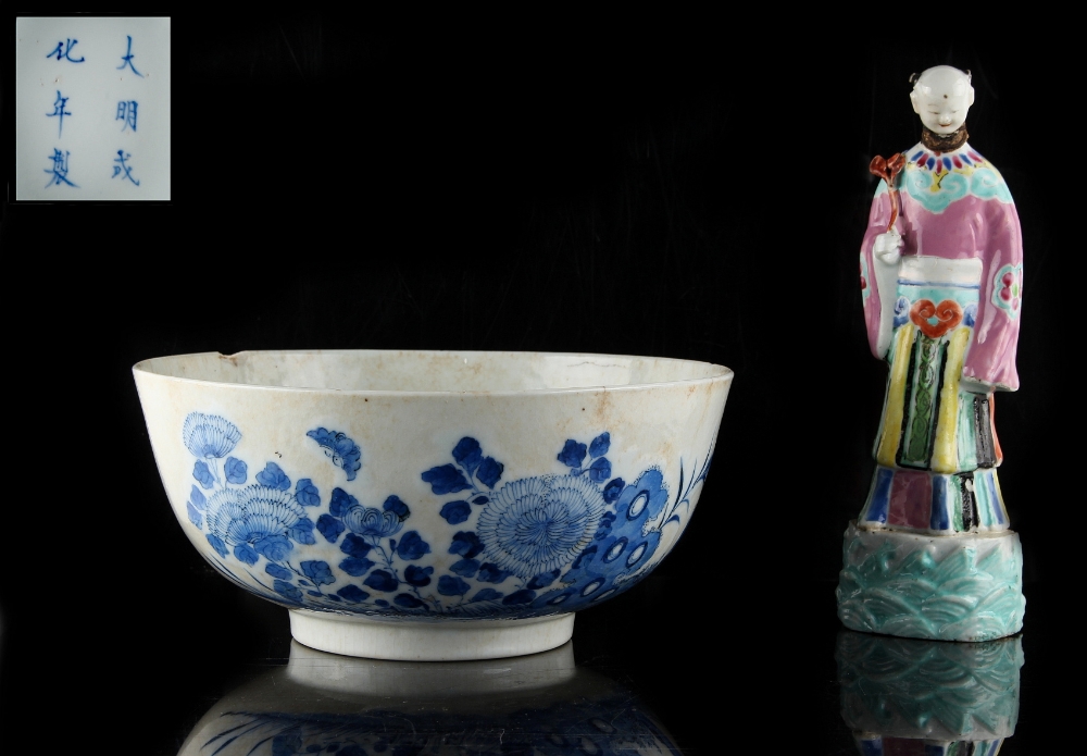 Property of a lady - a Chinese blue & white bowl painted with a bird & bat among flowers, Chenghua