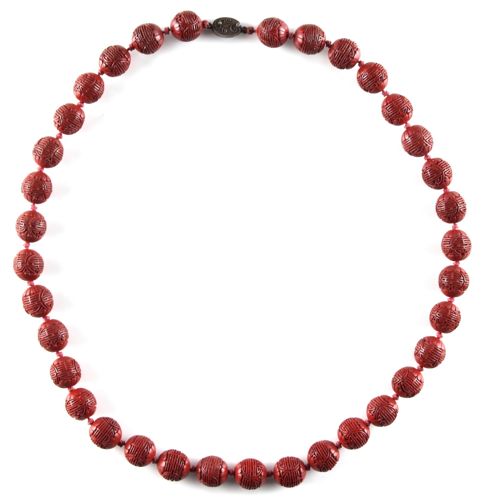 Property of a lady - a Chinese cinnabar lacquer bead necklace, the thirty-five individually - Image 2 of 2