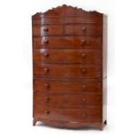 Property of a gentleman - an early 19th century mahogany bow-fronted tallboy or chest-on-chest, with