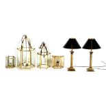 A quantity of assorted lighting including a pair of brass Corinthian column table lamps with shades,