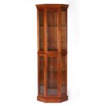 Property of a lady - a modern glazed freestanding corner cabinet, 72.5ins. (184cms.) high (see