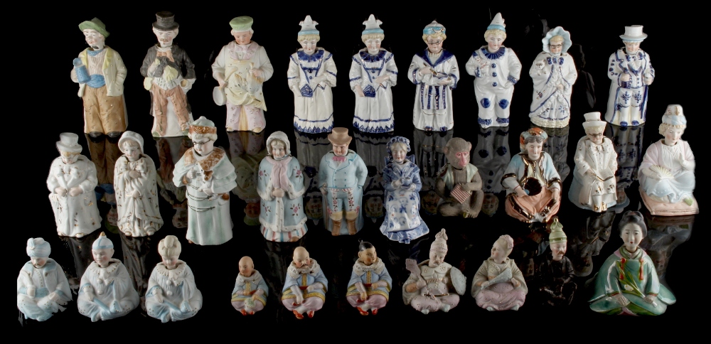 Property of a lady - a collection of twenty-nine 'nodding head' figures, late 19th / early 20th