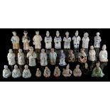 Property of a lady - a collection of twenty-nine 'nodding head' figures, late 19th / early 20th