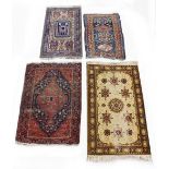 Property of a deceased estate - two early 20th century Persian rugs, the larger 55 by 39ins. (140 by