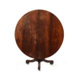 Property of a lady - a late Regency period rosewood circular tilt-top breakfast table, circa 1830,