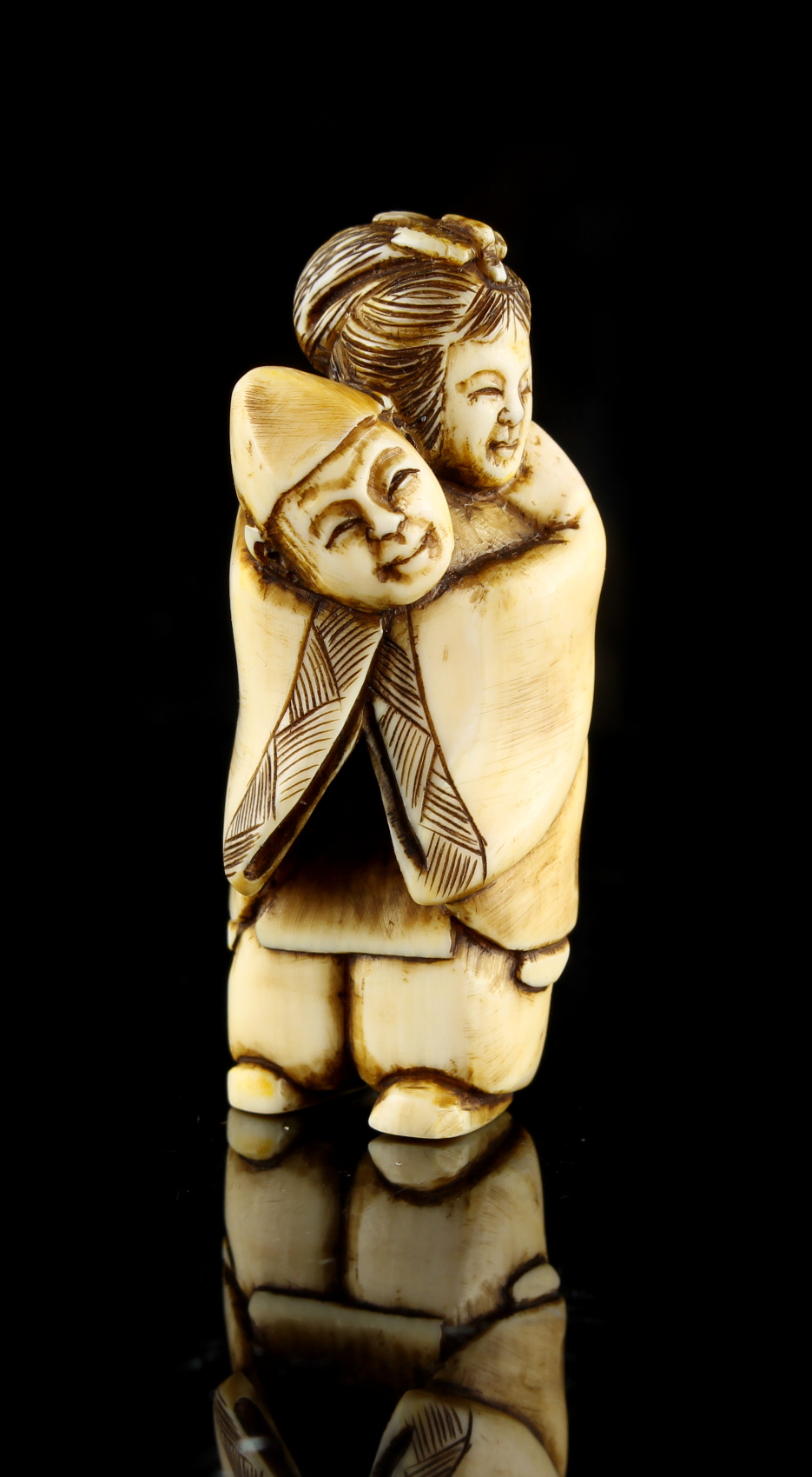 The Ronald Hart Collection of Japanese Netsukes - a carved ivory netsuke modelled as a standing - Image 3 of 5