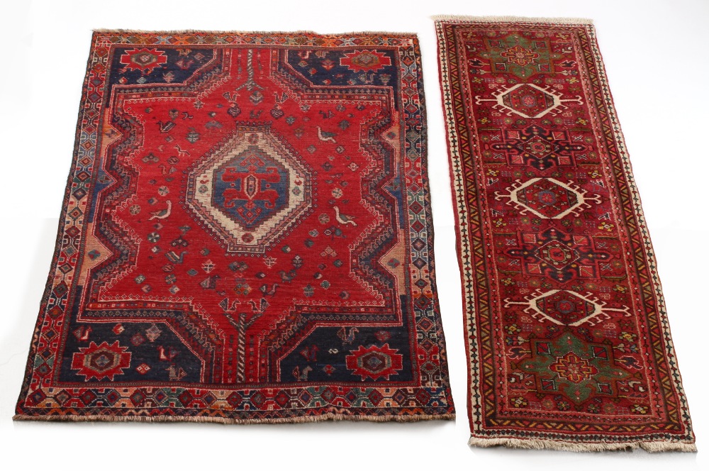 Property of a gentleman - a modern Persian Qashgai rug with red ground, 66 by 48ins. (168 by