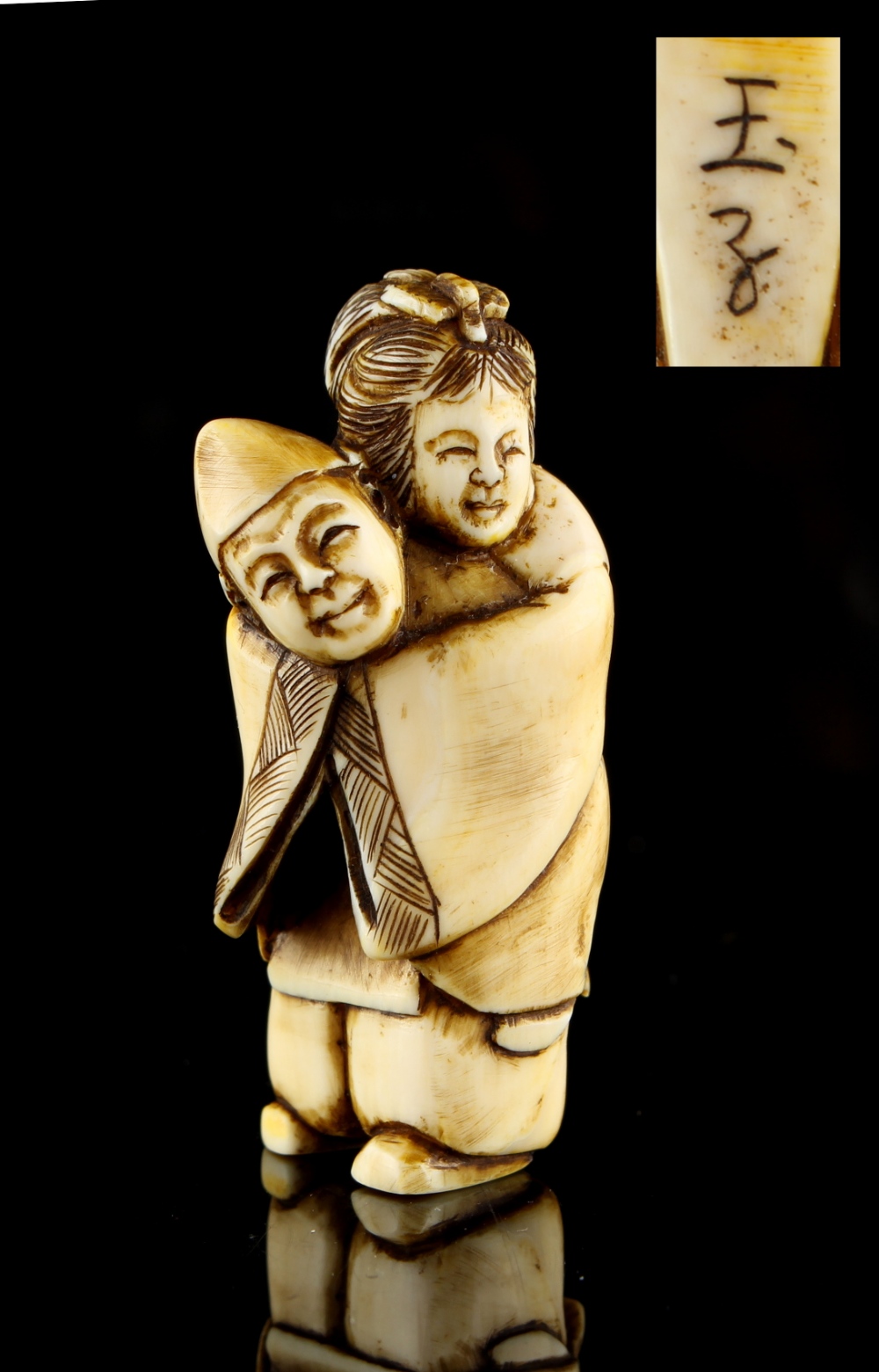 The Ronald Hart Collection of Japanese Netsukes - a carved ivory netsuke modelled as a standing