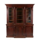 Property of a gentleman - a Victorian mahogany breakfront bookcase, enclosing adjustable shelves,