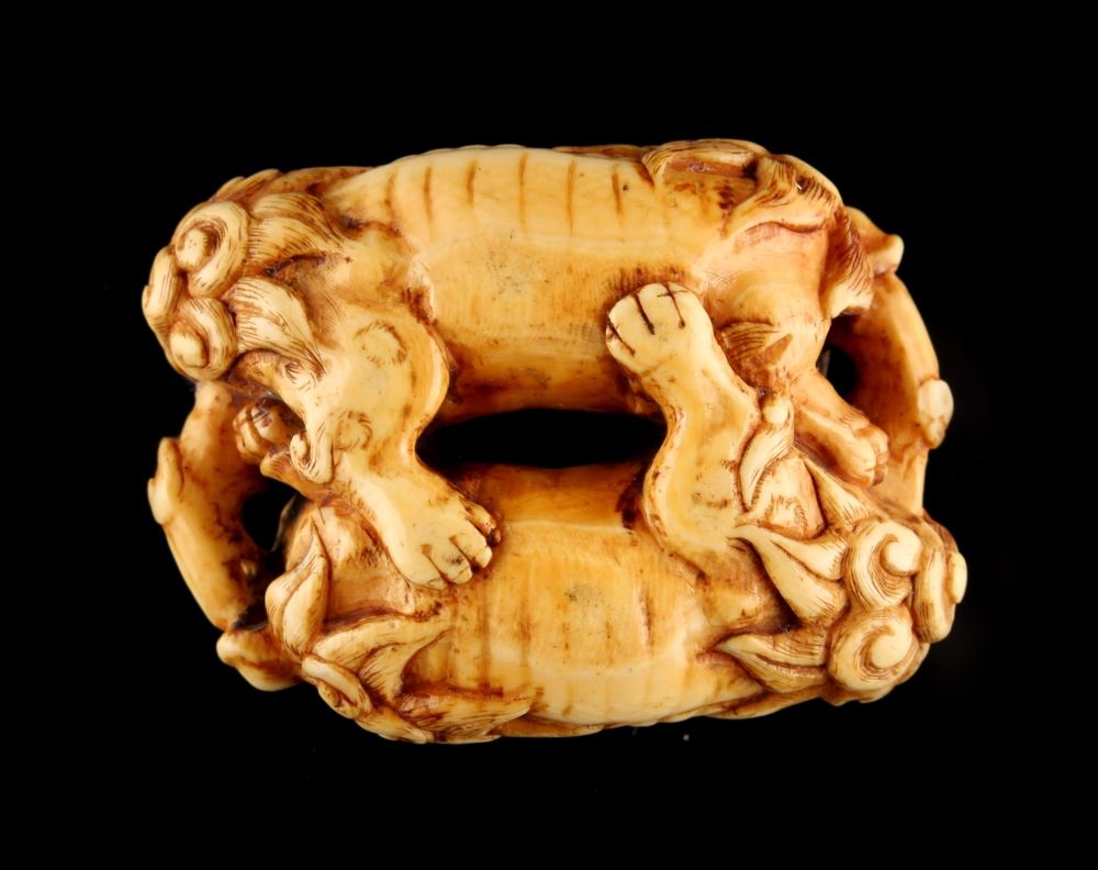 The Ronald Hart Collection of Japanese Netsukes - a carved ivory netsuke modelled as two recumbent - Image 4 of 4