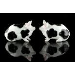 Property of a gentleman - a pair of Wemyss models of pigs, with black & pink painted decorations,