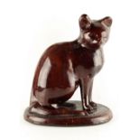 Property of a lady - a large Victorian Staffordshire treacle glazed model of a seated cat, 11.