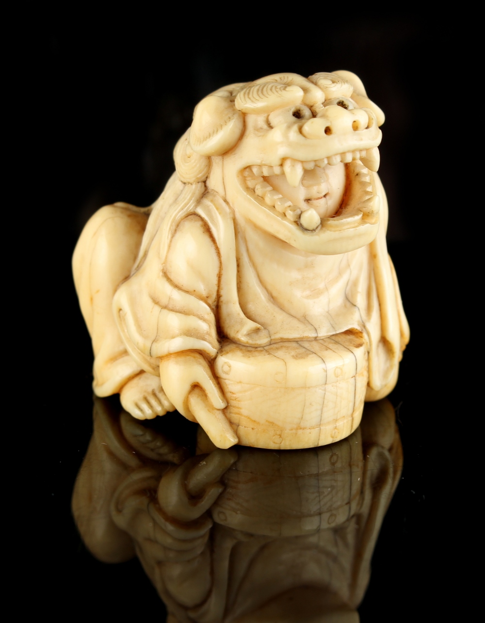 The Gill Collection of Japanese Netsukes - a carved ivory netsuke modelled as a seated boy - Image 2 of 6