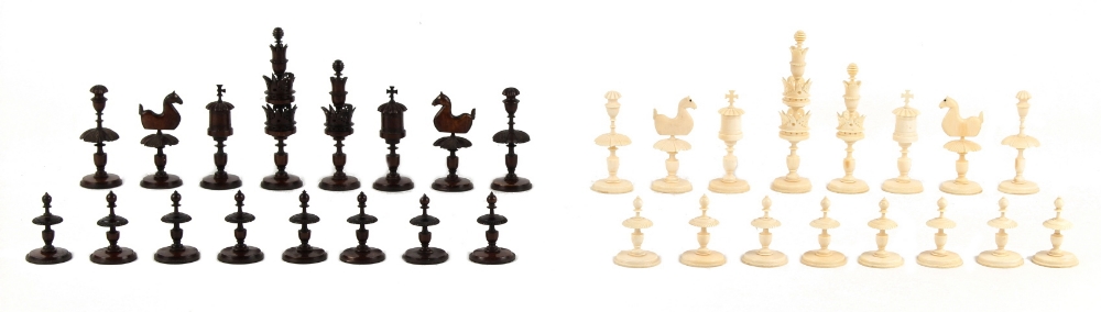 Property of a lady - a German turned & carved ivory 'Selenus' type chess set, natural & stained,