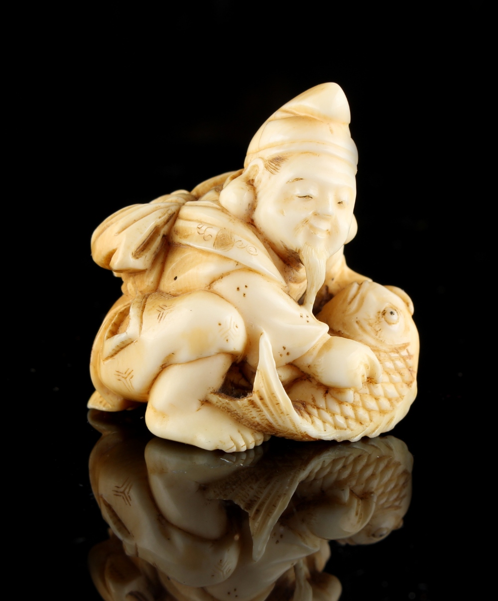 The Ronald Hart Collection of Japanese Netsukes - a carved ivory netsuke modelled as a kneeling - Image 3 of 5