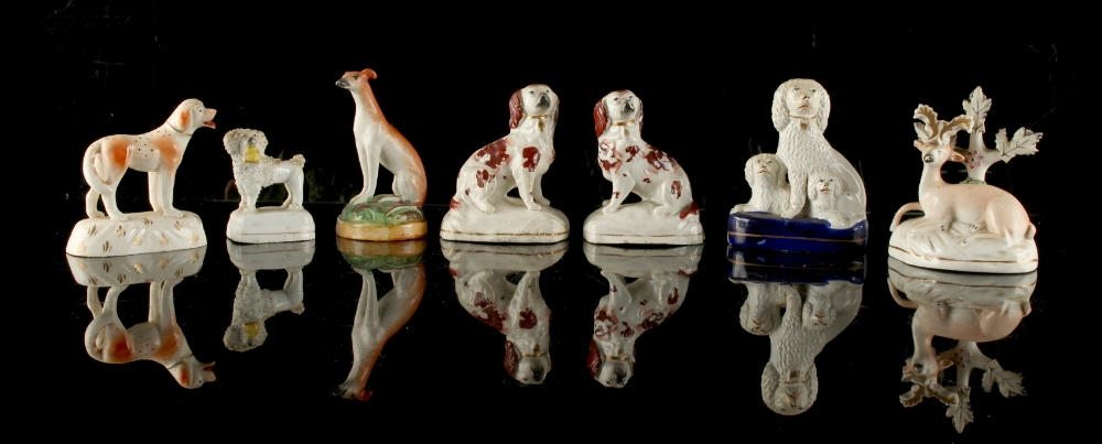 Property of a lady - a collection of six Victorian Staffordshire models of dogs including a pair