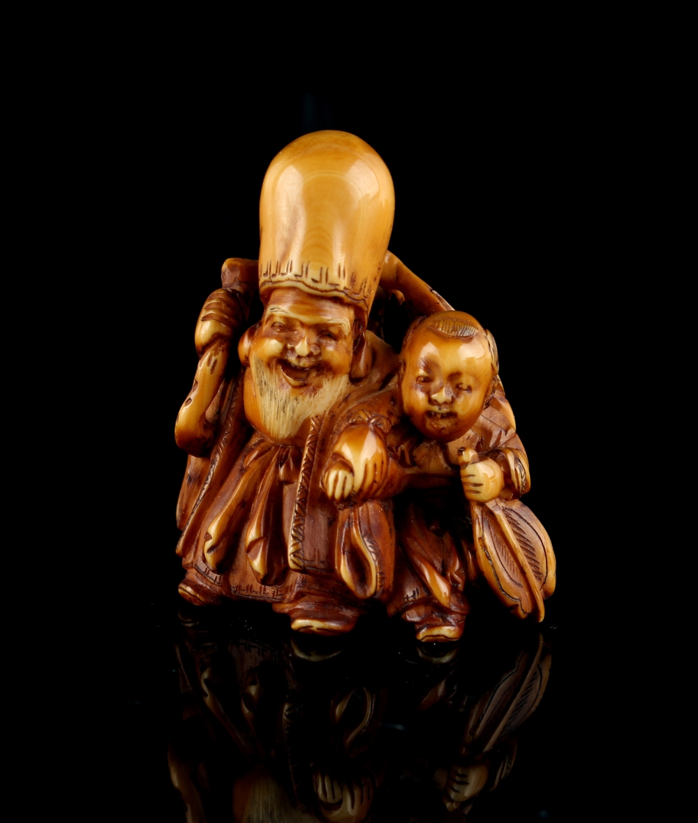 The Gill Collection of Japanese Netsukes - a carved ivory netsuke modelled as Fukurokuju with a boy, - Image 3 of 5