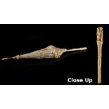 A good 19th century Continental ivory handled parasol, probably Dieppe, the 11-inch (28cms.) long